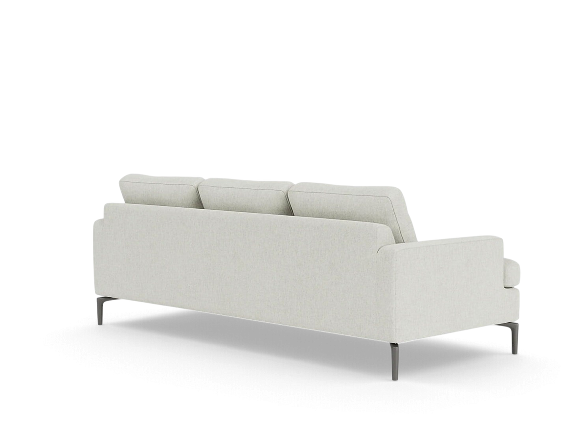 Back view of the urbane EQ3 Eve Classic Sofa in light beige fabric with sleek solid aluminum legs.