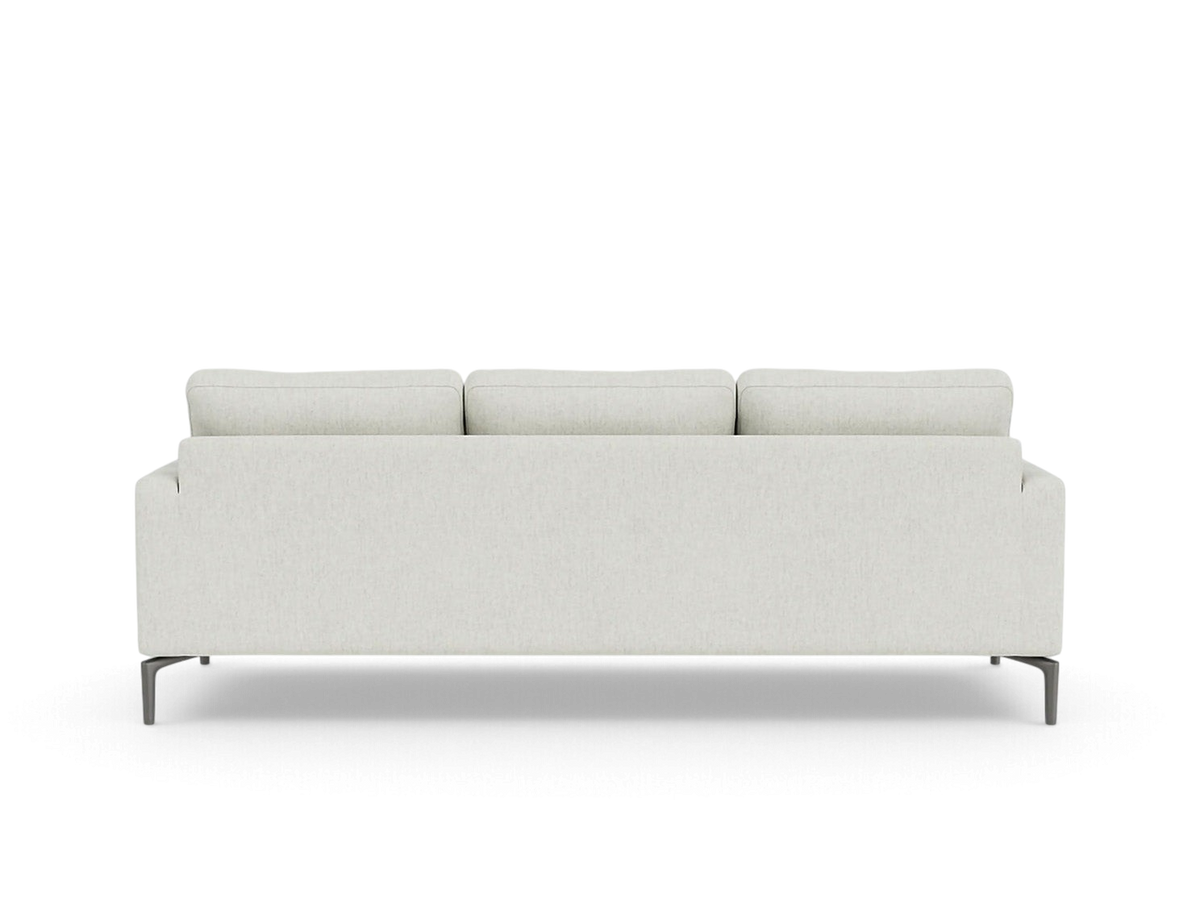 urbane EQ3 Eve Classic sofa in light beige fabric with solid aluminum legs, shown from a straight back view.