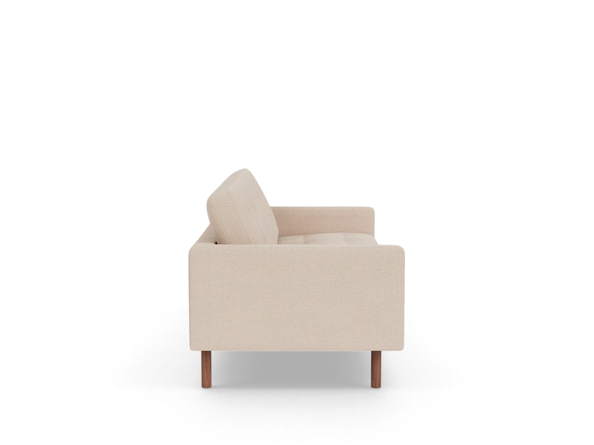 urbane EQ3 Joan 83 inch tufted sofa in beige fabric with mid-century modern wooden legs, side profile view