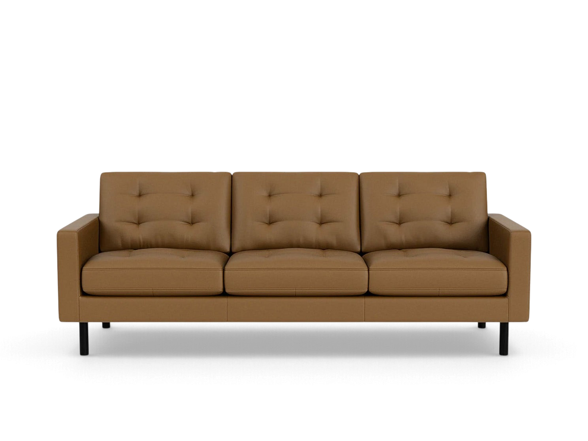 urbane EQ3 Joan 87-inch mid-century modern sofa in tan leather with tufted back cushions and black metal legs