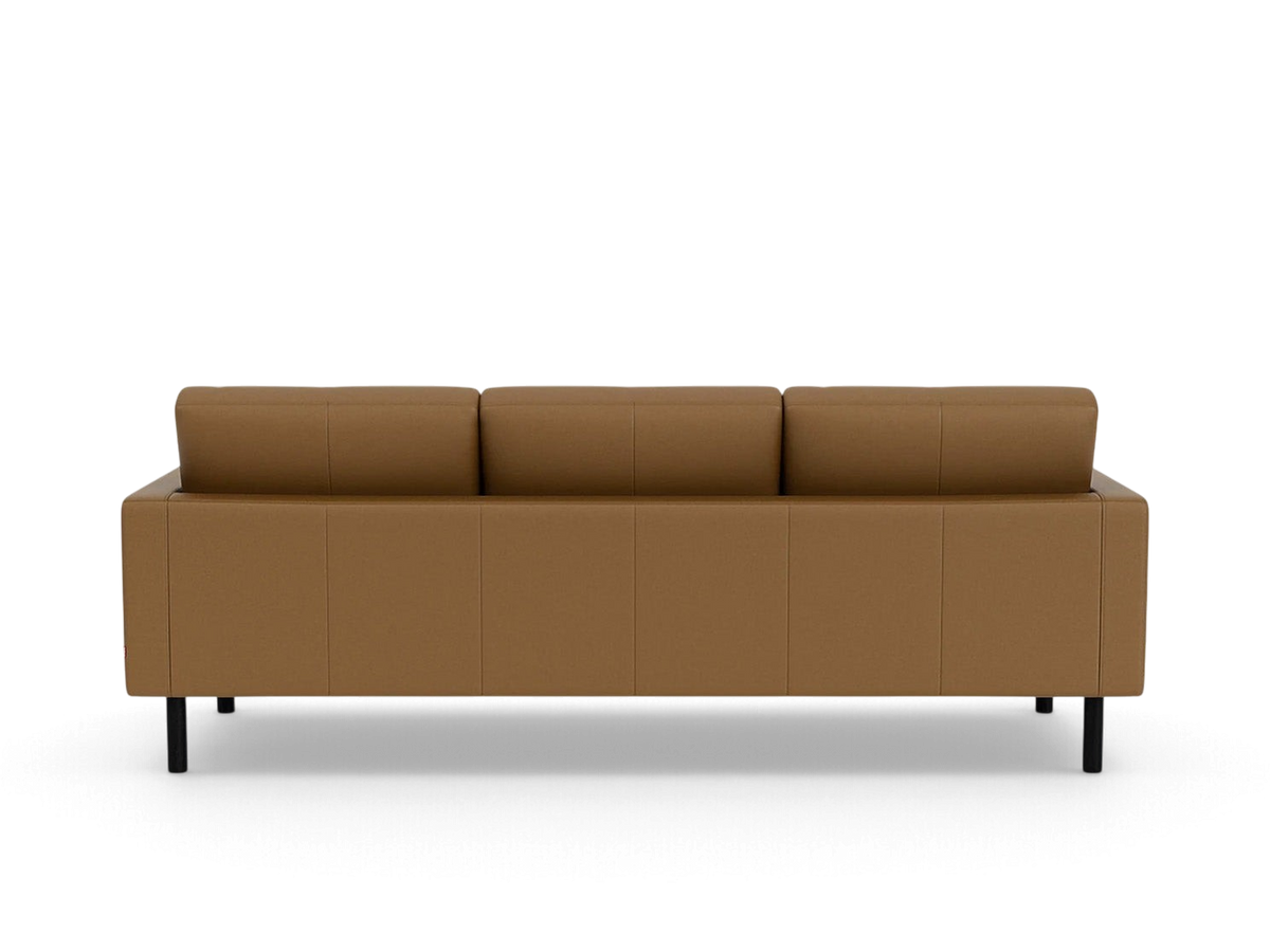 Back view of the urbane EQ3 Joan 87 inch mid-century modern sofa in tan upholstery with black legs