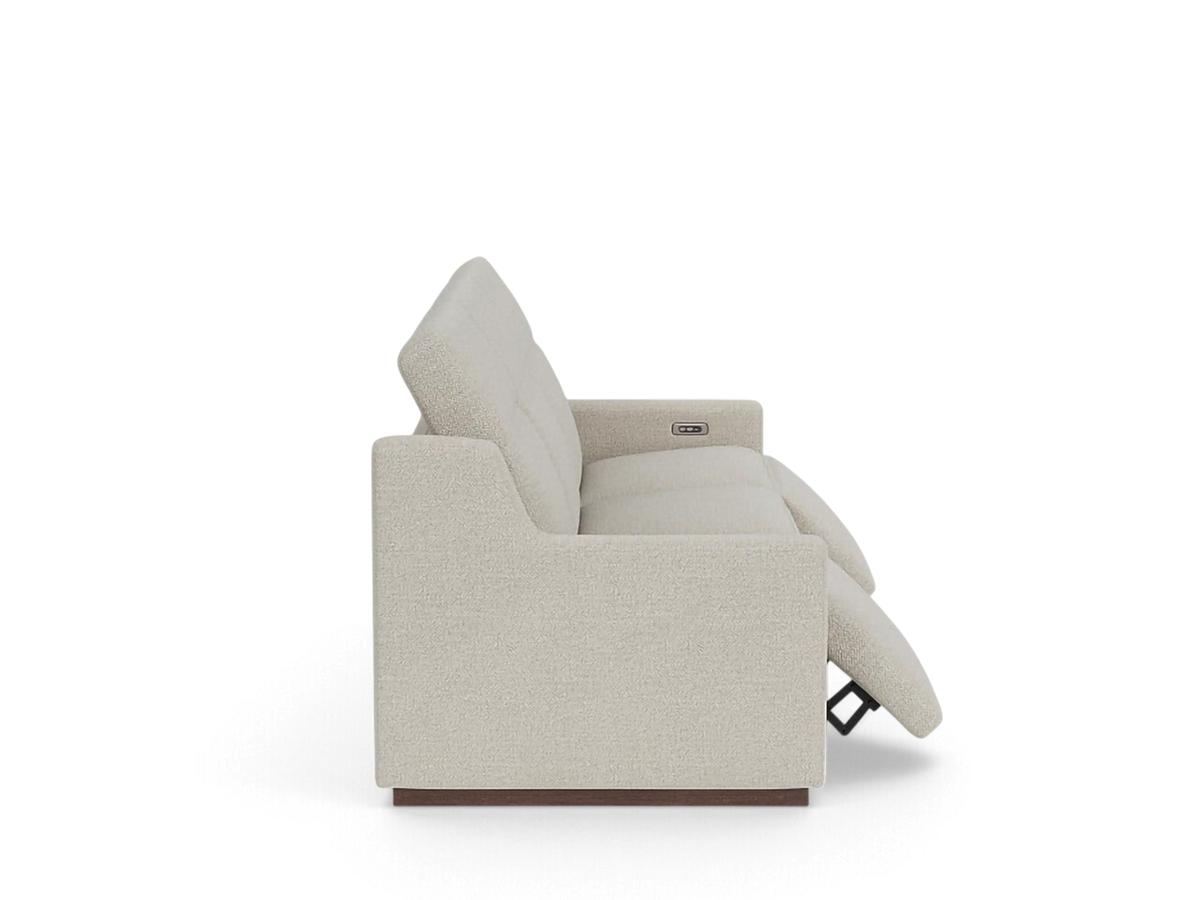 urbane EQ3 Laze reclining sofa in cream fabric with power recline and USB charging, side profile view.