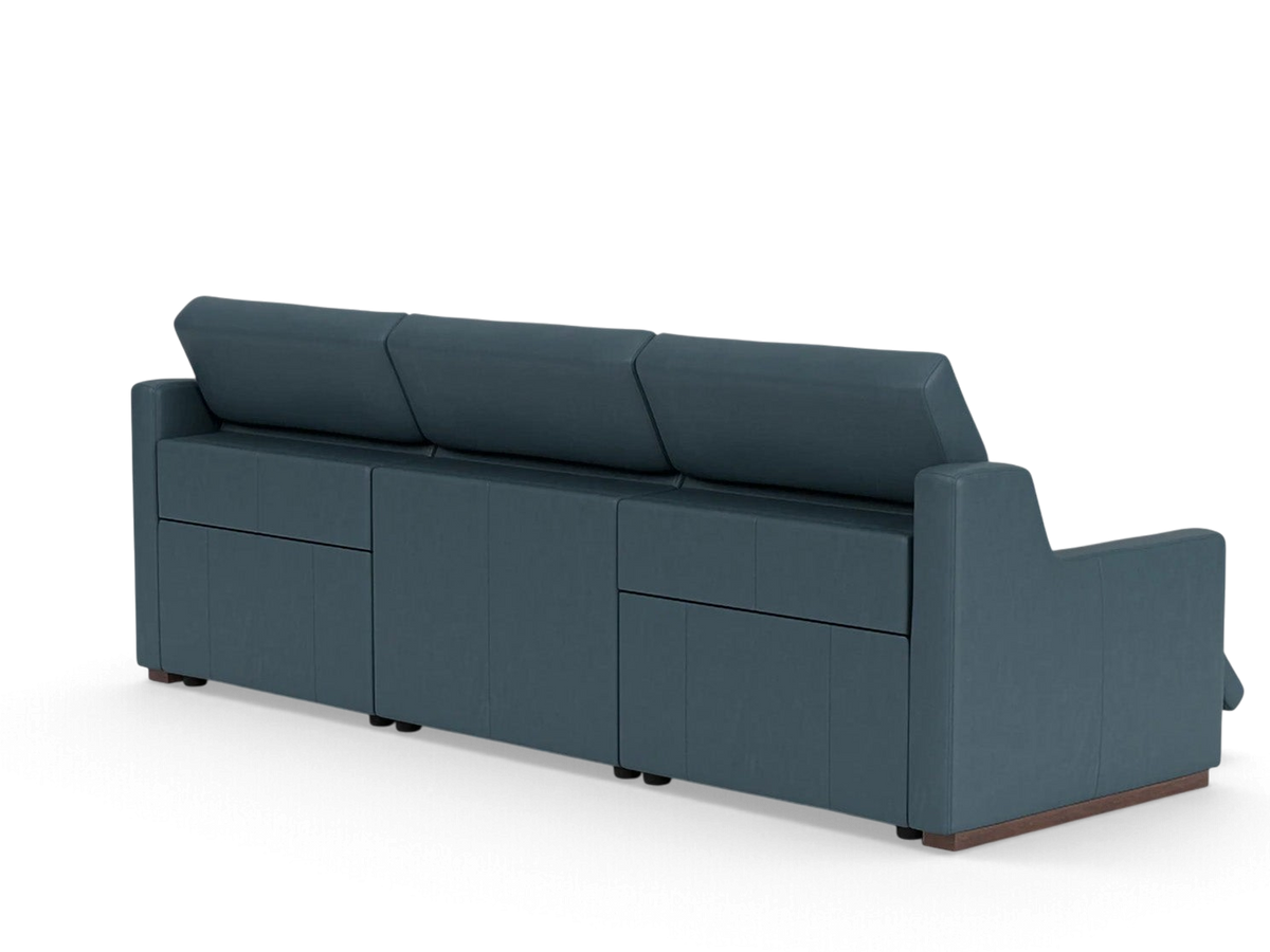 urbane EQ3 Laze reclining sofa in dark blue leather with a sleek, modern silhouette and power reclining features.
