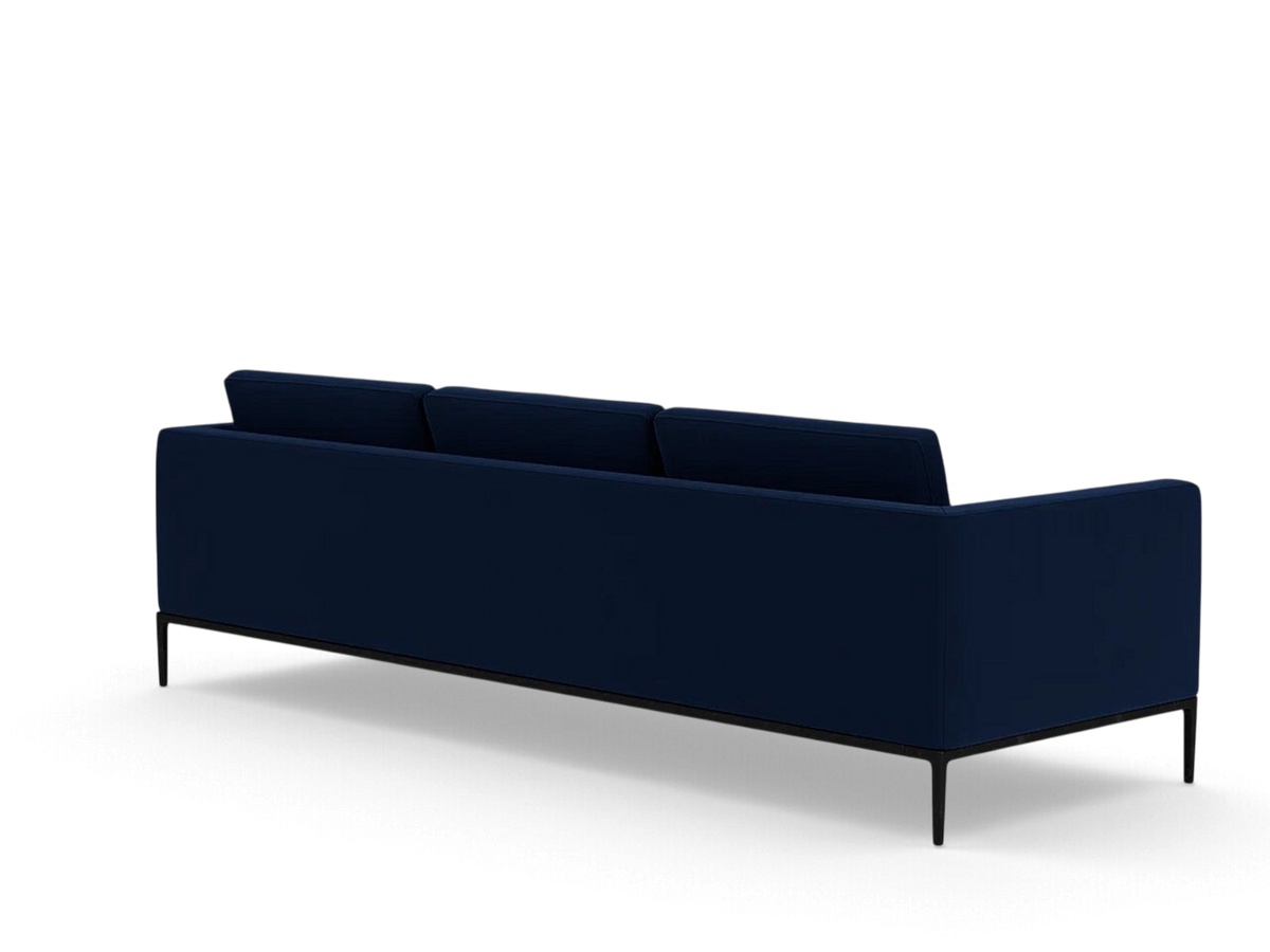 urbane EQ3 Oma 101 inch sofa in dark blue upholstery with a sleek black anthracite metal base, rear view