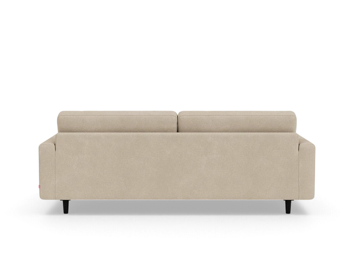 Back view of the urbane EQ3 Oskar 85 inch sofa in a neutral beige fabric with black tapered legs.