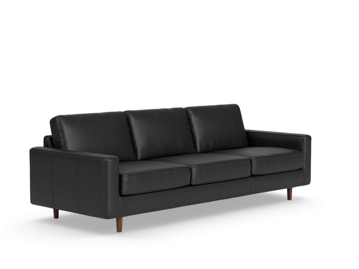 urbane EQ3 Oskar 93 inch black leather sofa with loose cushions and tapered wooden legs