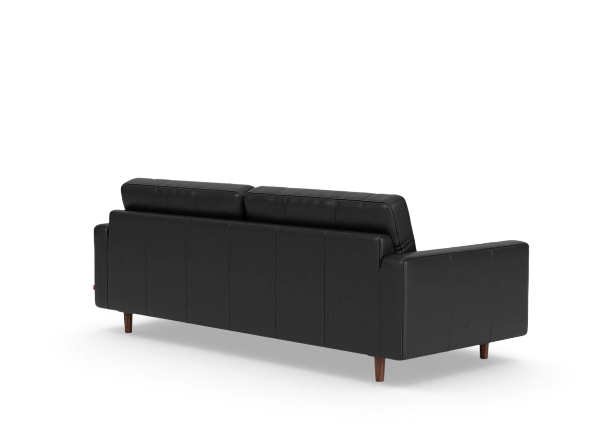 urbane EQ3 Oskar 85 inch black leather sofa viewed from the back showing wooden legs and clean minimalist design
