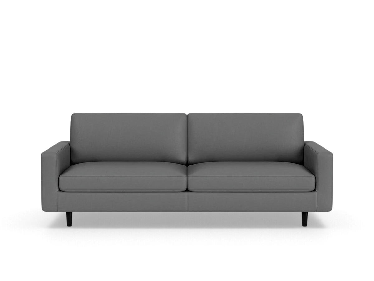 urbane EQ3 Oskar Plush 85 inch sofa in grey upholstery with modern black legs and feather-filled cushions