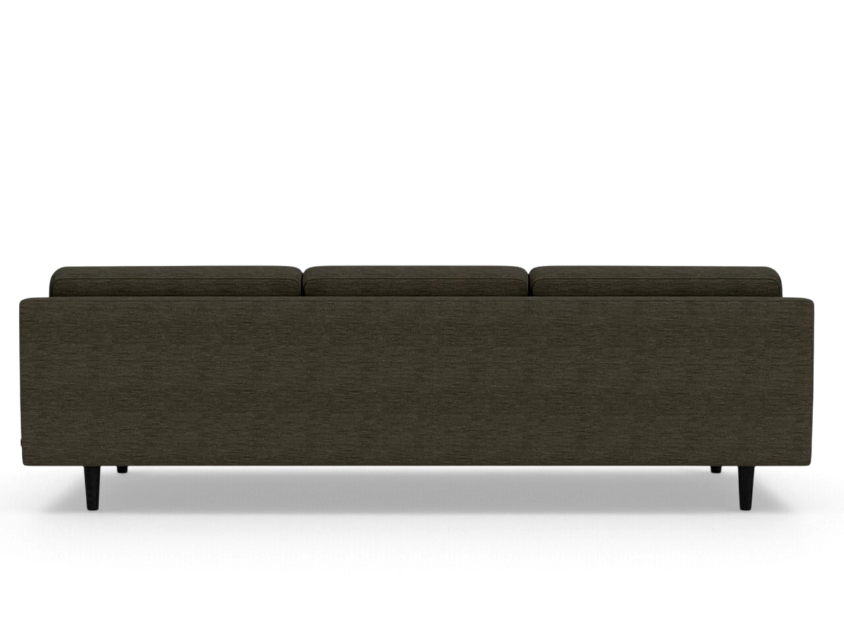 Back view of the urbane EQ3 Remi 101 inch sofa in dark grey fabric with tapered black legs.
