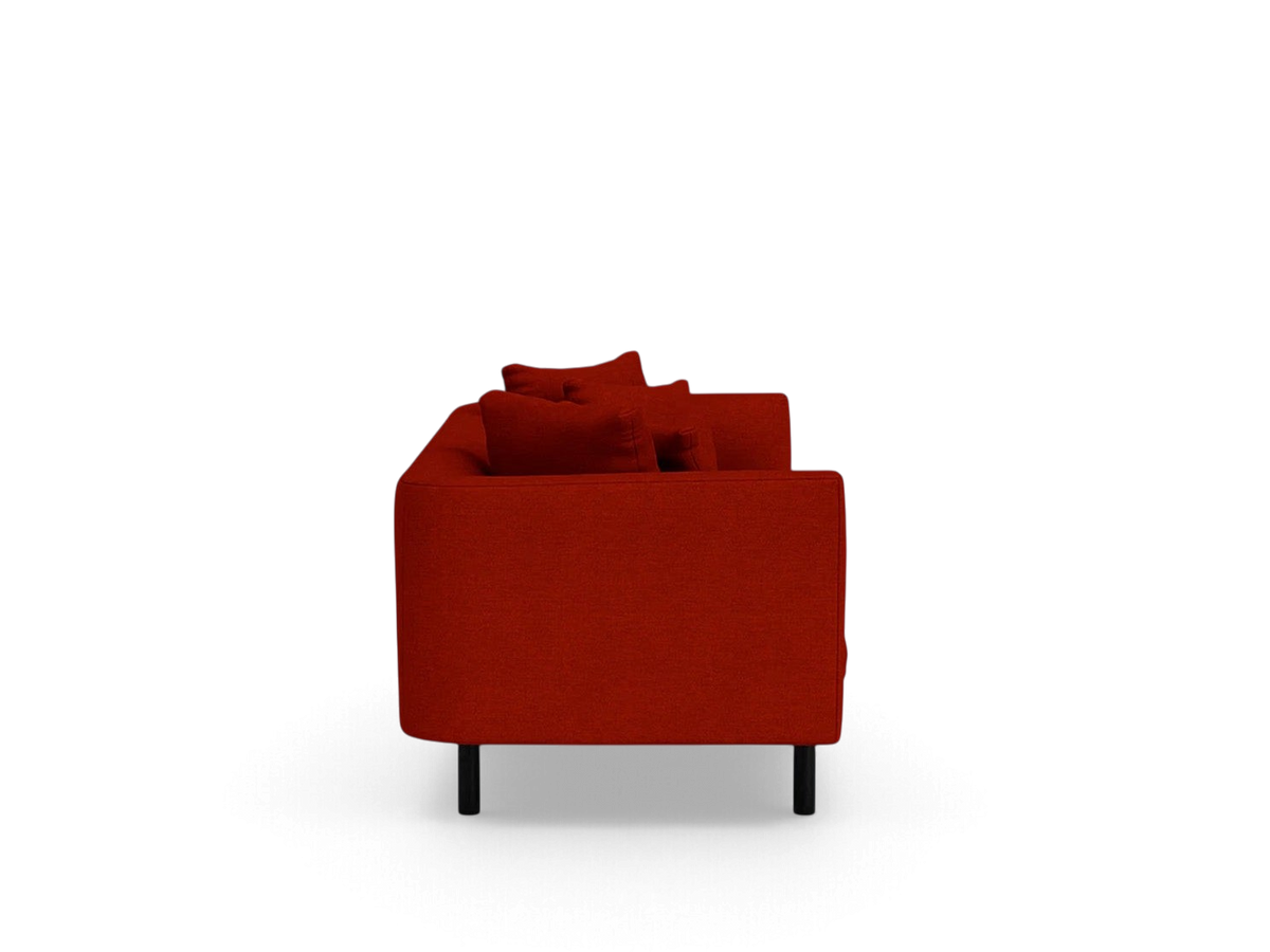urbane EQ3 Replay 91 inch sofa in red fabric with a flexible back frame and black legs, side view