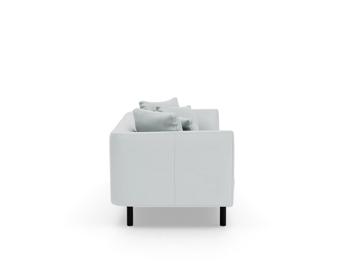 urbane EQ3 Replay 91 inch sofa in light grey fabric with a sleek modern profile and black legs, side view
