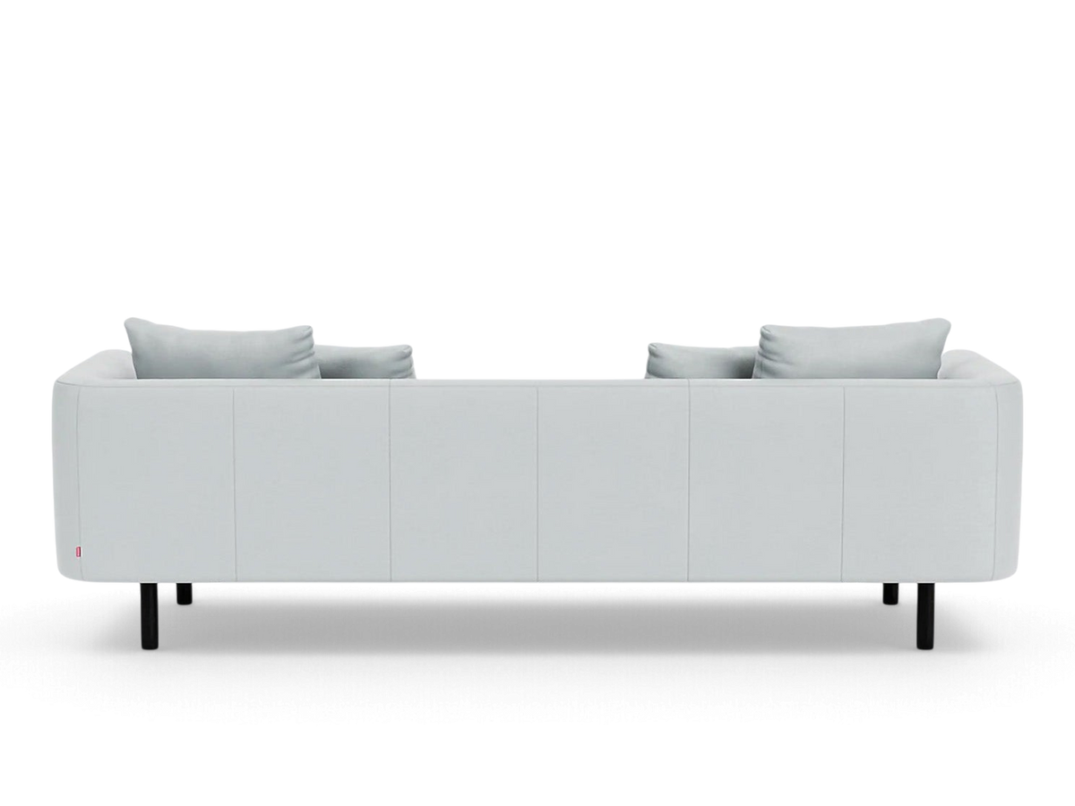 urbane EQ3 Replay 99 inch sofa in light grey fabric with a sleek back view and black legs