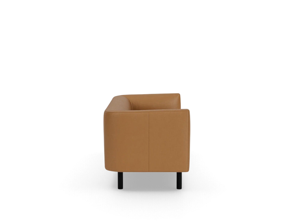urbane EQ3 Replay Club sofa in tan leather with a compact design and black legs, side view