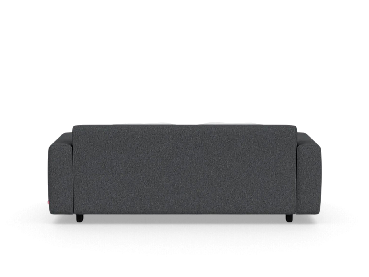 urbane EQ3 Reva double sleeper sofa in dark grey fabric viewed from the back showing a sleek modern silhouette