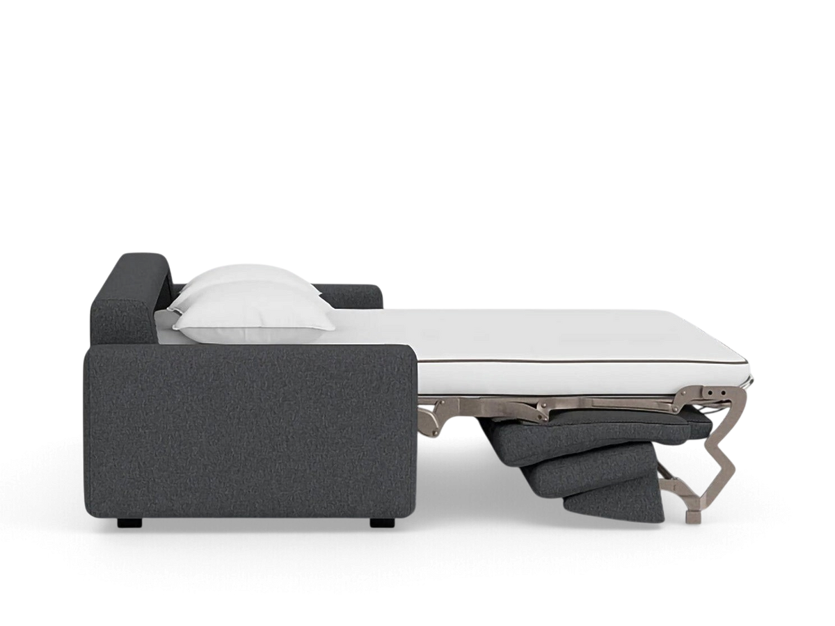 urbane EQ3 Reva queen sleeper sofa in dark grey fabric with memory foam mattress extended in side profile view