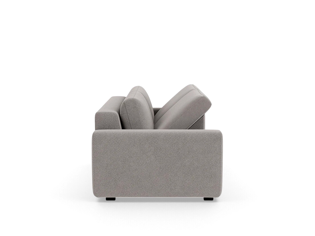 Side profile of the urbane EQ3 Reva Storage Sofa in a neutral grey fabric with a sleek, compact silhouette.