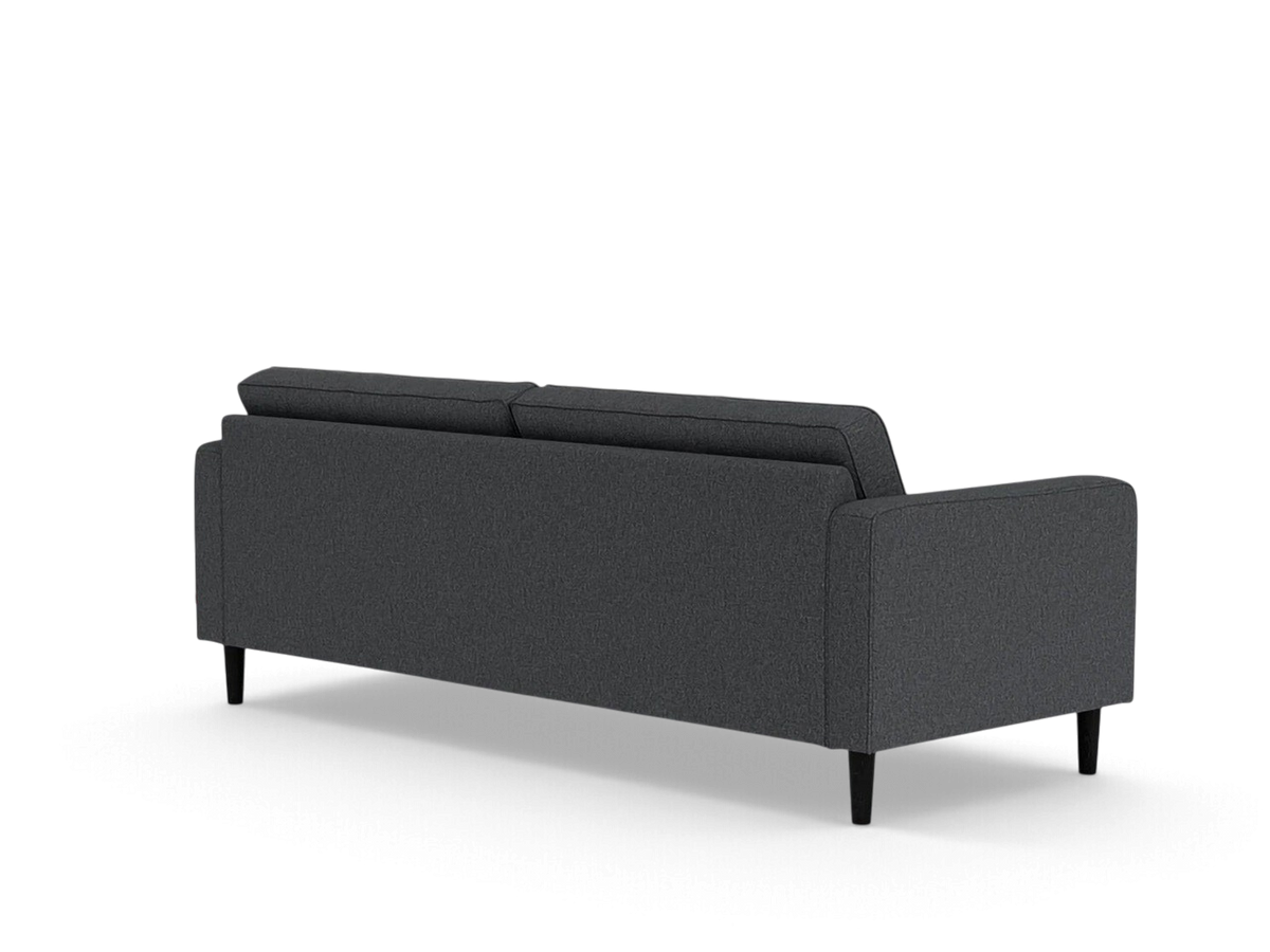 urbane EQ3 Reverie 86-inch sofa in dark grey fabric with button-tufted back and tapered wooden legs, rear view