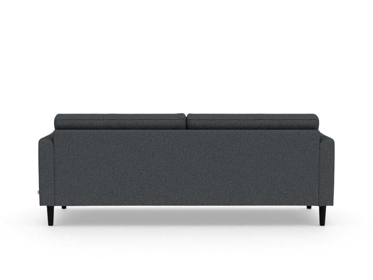 urbane EQ3 Reverie 86-inch sofa in dark grey fabric with tapered black wooden legs, back view