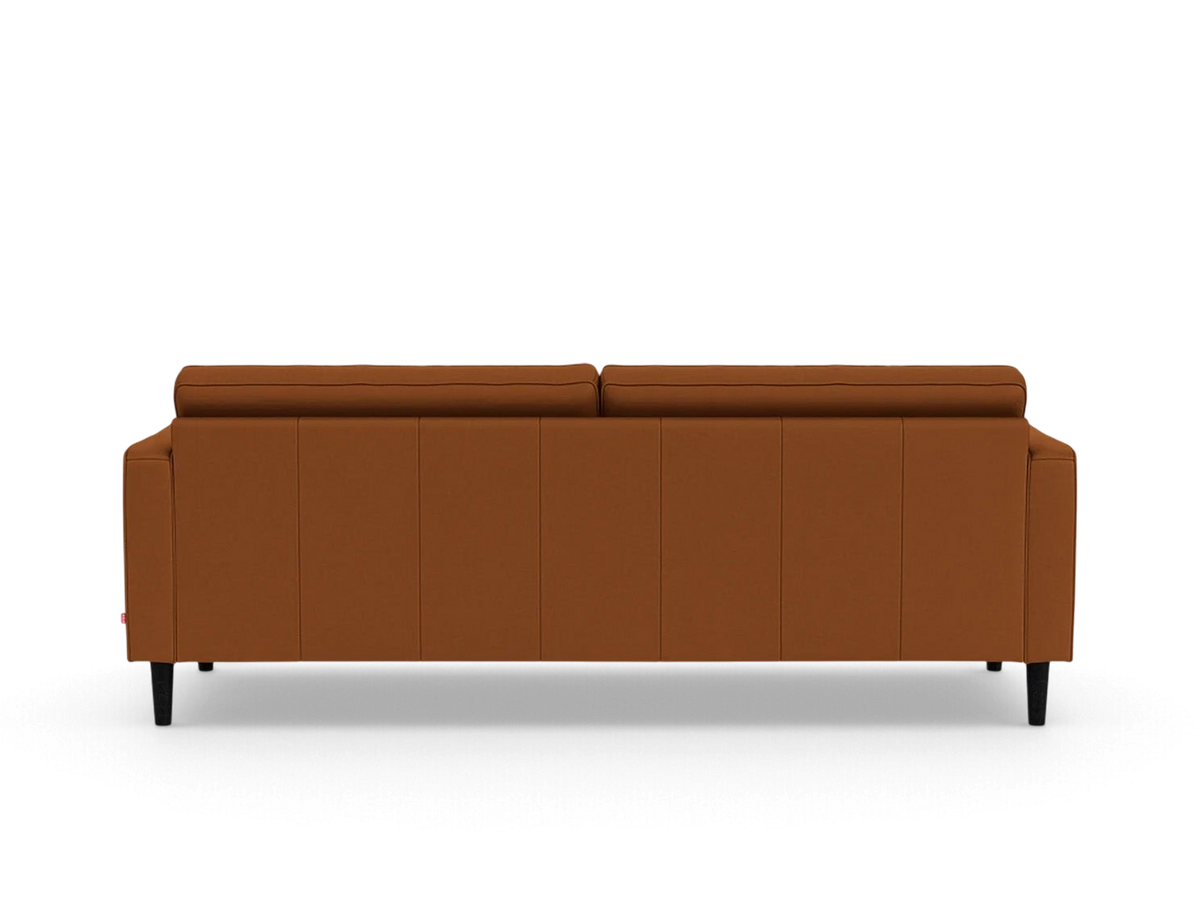urbane EQ3 Reverie 86-inch sofa in a warm brown fabric, featuring a mid-century modern back view with tapered legs.