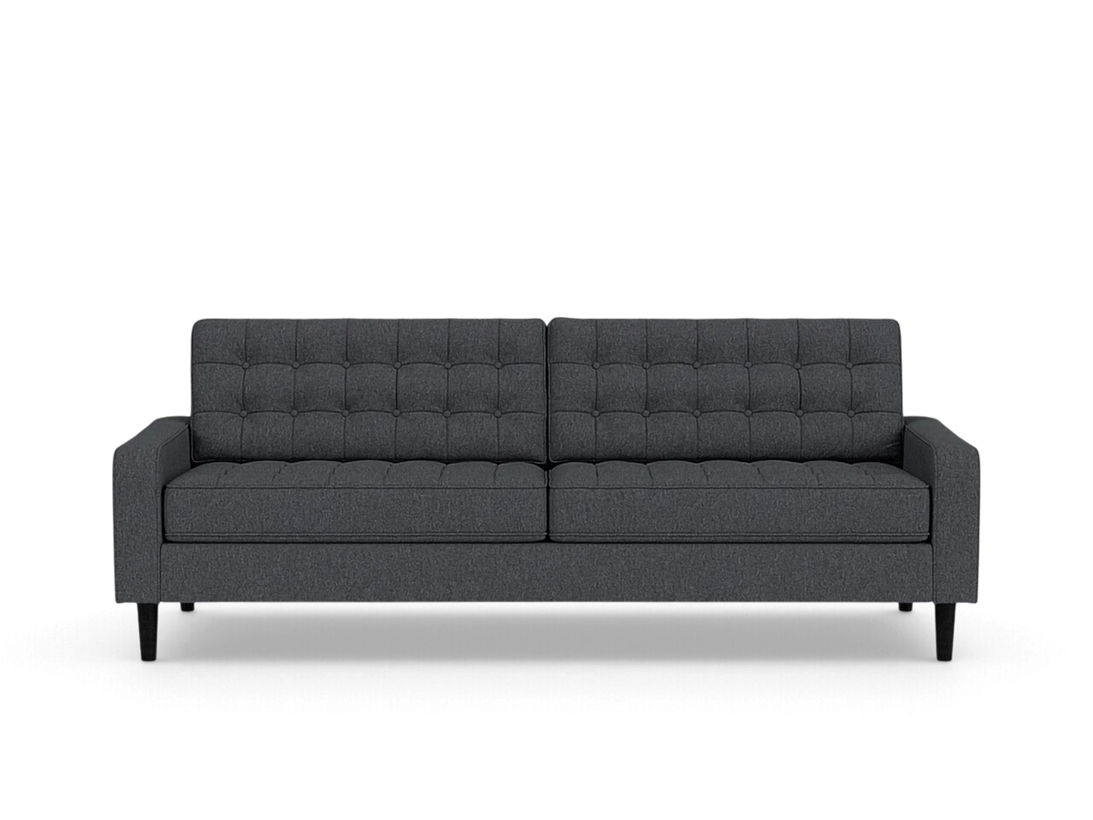 urbane EQ3 Reverie 86-inch charcoal grey sofa with button-tufted cushions and tapered wooden legs