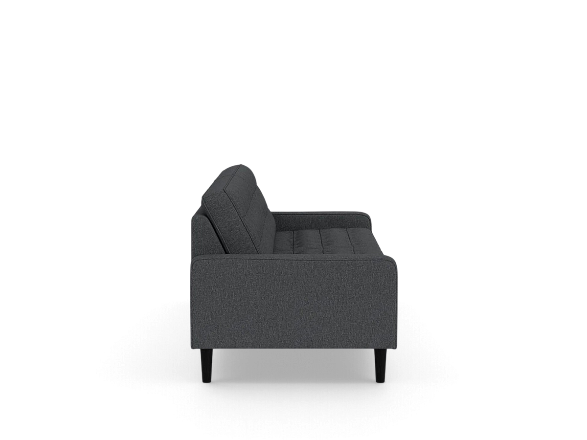 urbane EQ3 Reverie 86-inch sofa in dark grey fabric with button-tufted cushions and tapered black wooden legs side view