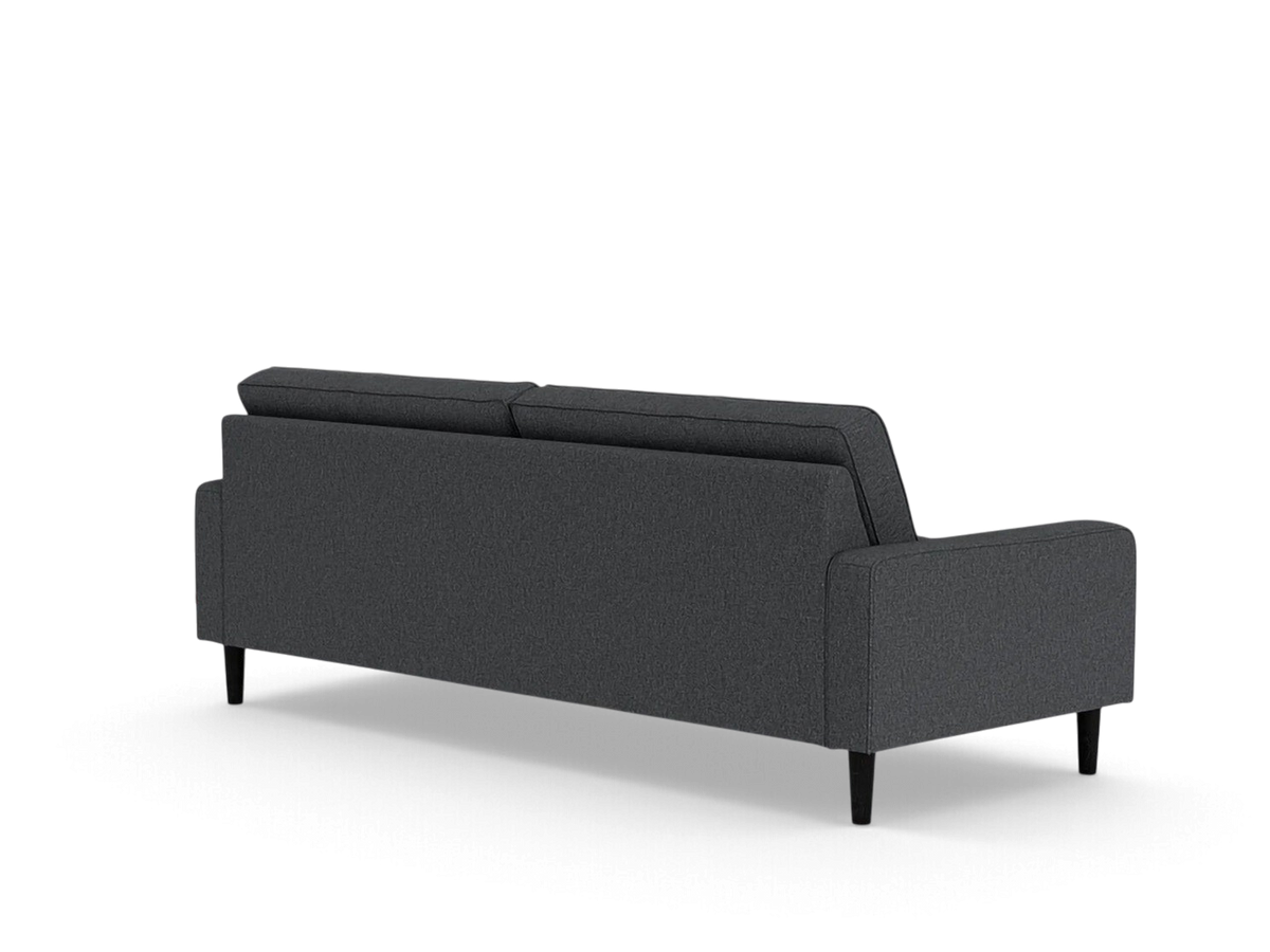 Back view of the urbane EQ3 Reverie 86 inch sofa in charcoal grey fabric with tapered wooden legs