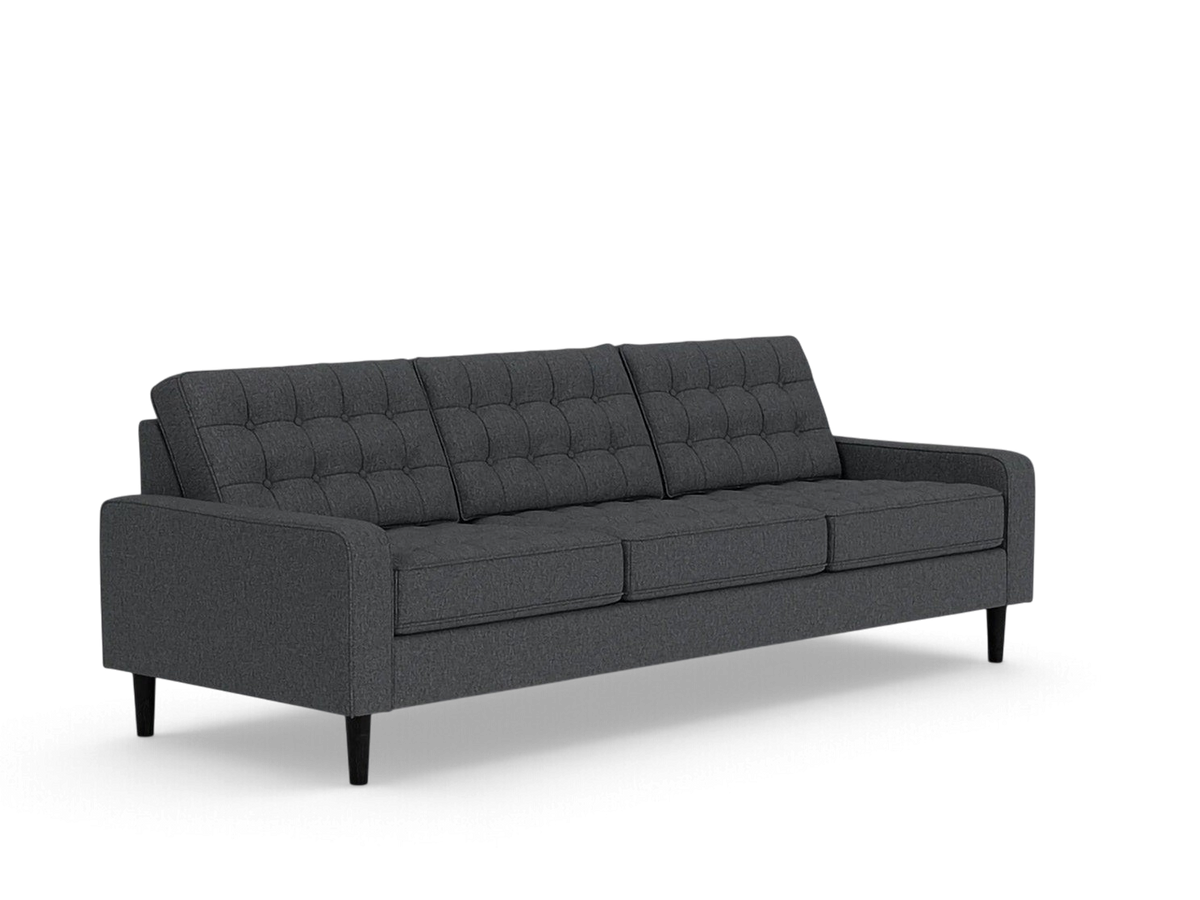urbane EQ3 Reverie 92-inch charcoal grey sofa with button-tufted cushions and tapered wooden legs in mid-century style