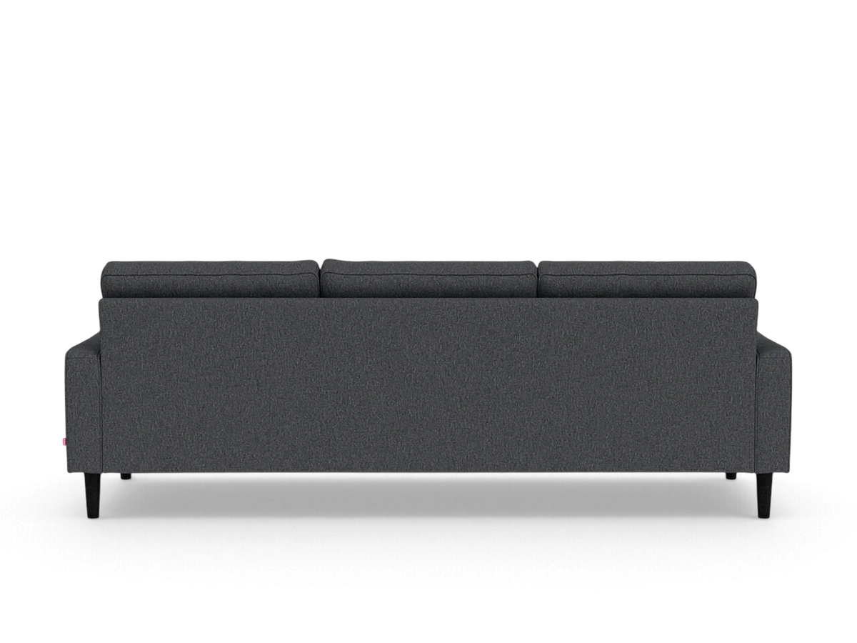 urbane EQ3 Reverie 92-inch sofa in dark grey fabric with tapered wooden legs, back view