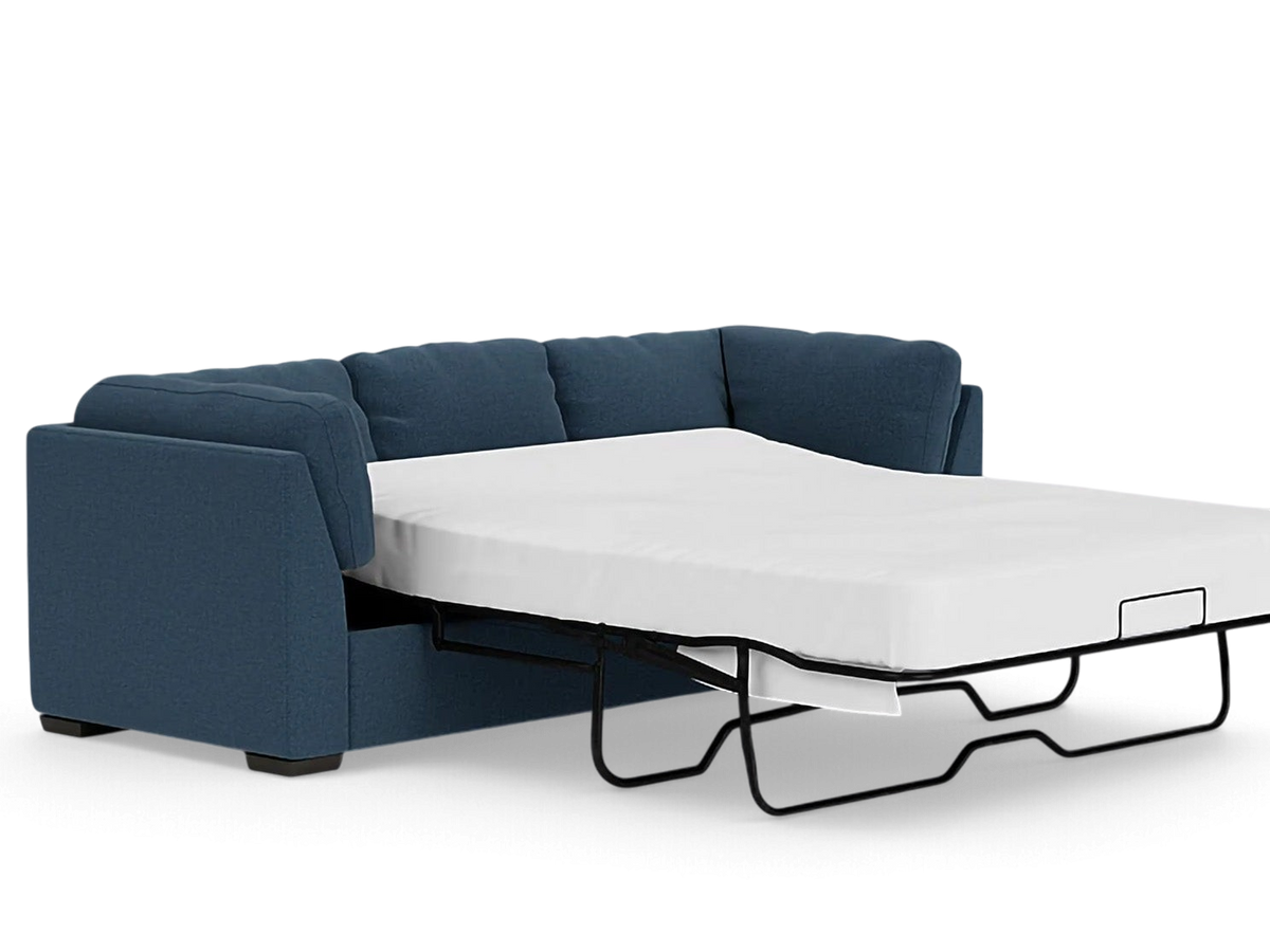urbane EQ3 Salema sleeper sofa in blue fabric with a pull-out mattress extended for guest use