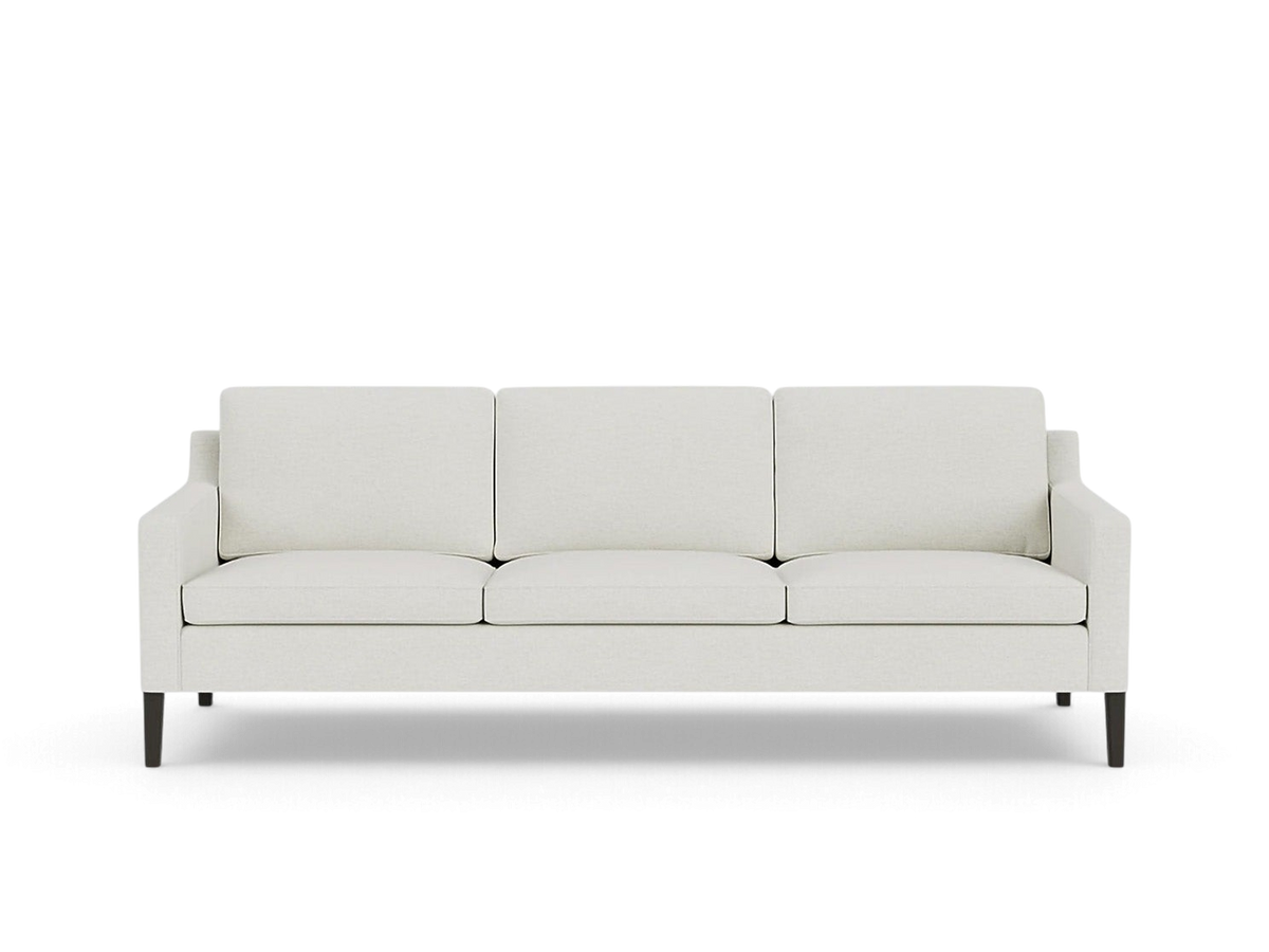 urbane EQ3 Skye sofa in a light beige fabric with a mid-century modern design and tapered dark wood legs