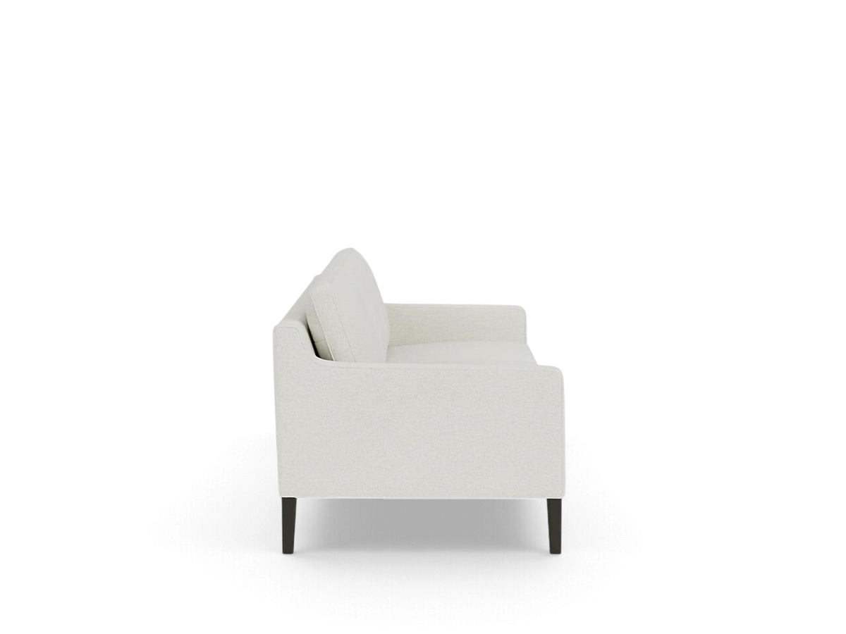 urbane EQ3 Skye sofa in light beige fabric with a mid-century modern design and dark tapered legs, side view