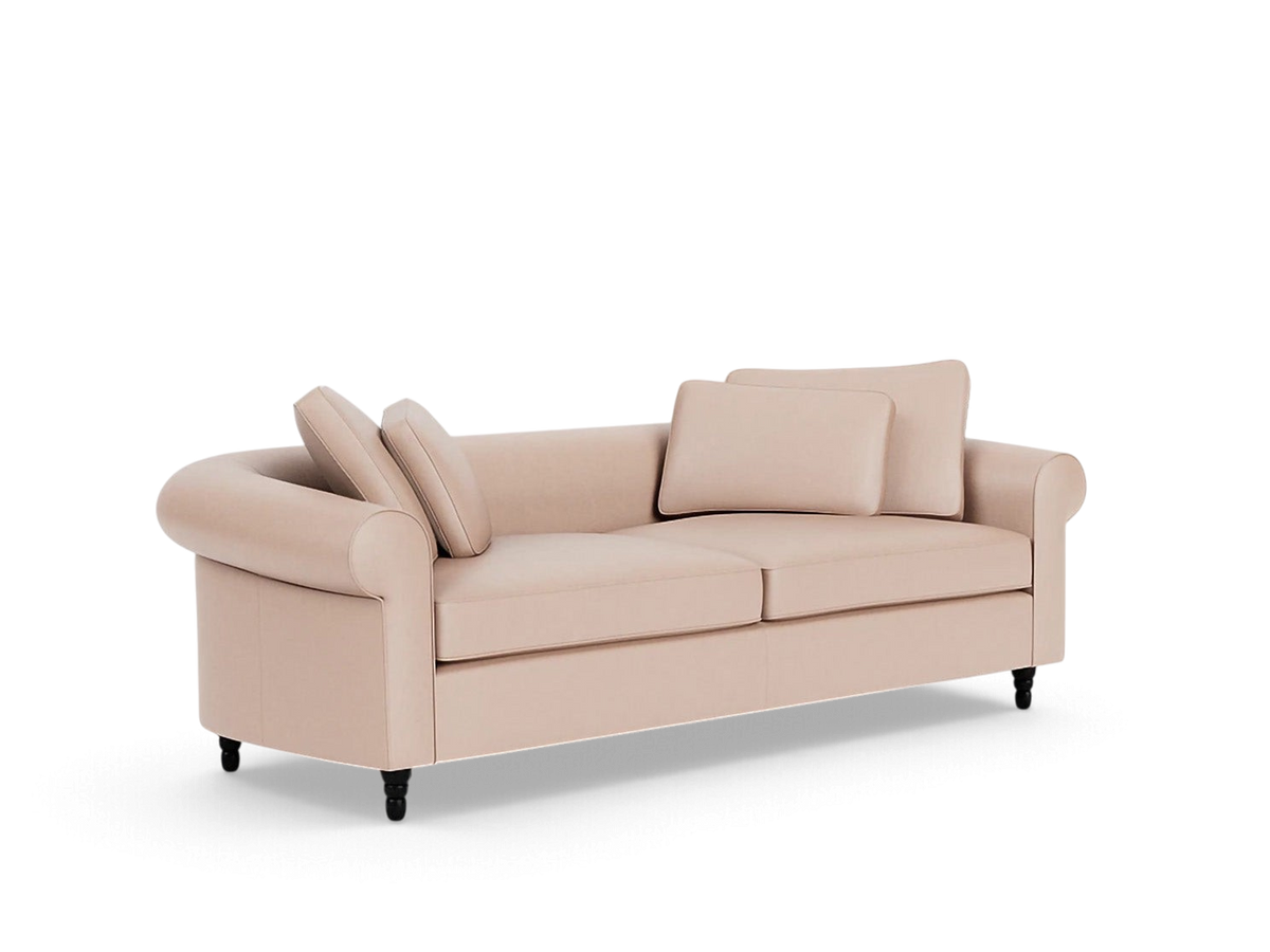 urbane EQ3 Slope 94 inch sofa in a soft blush fabric with rolled arms and matching accent pillows