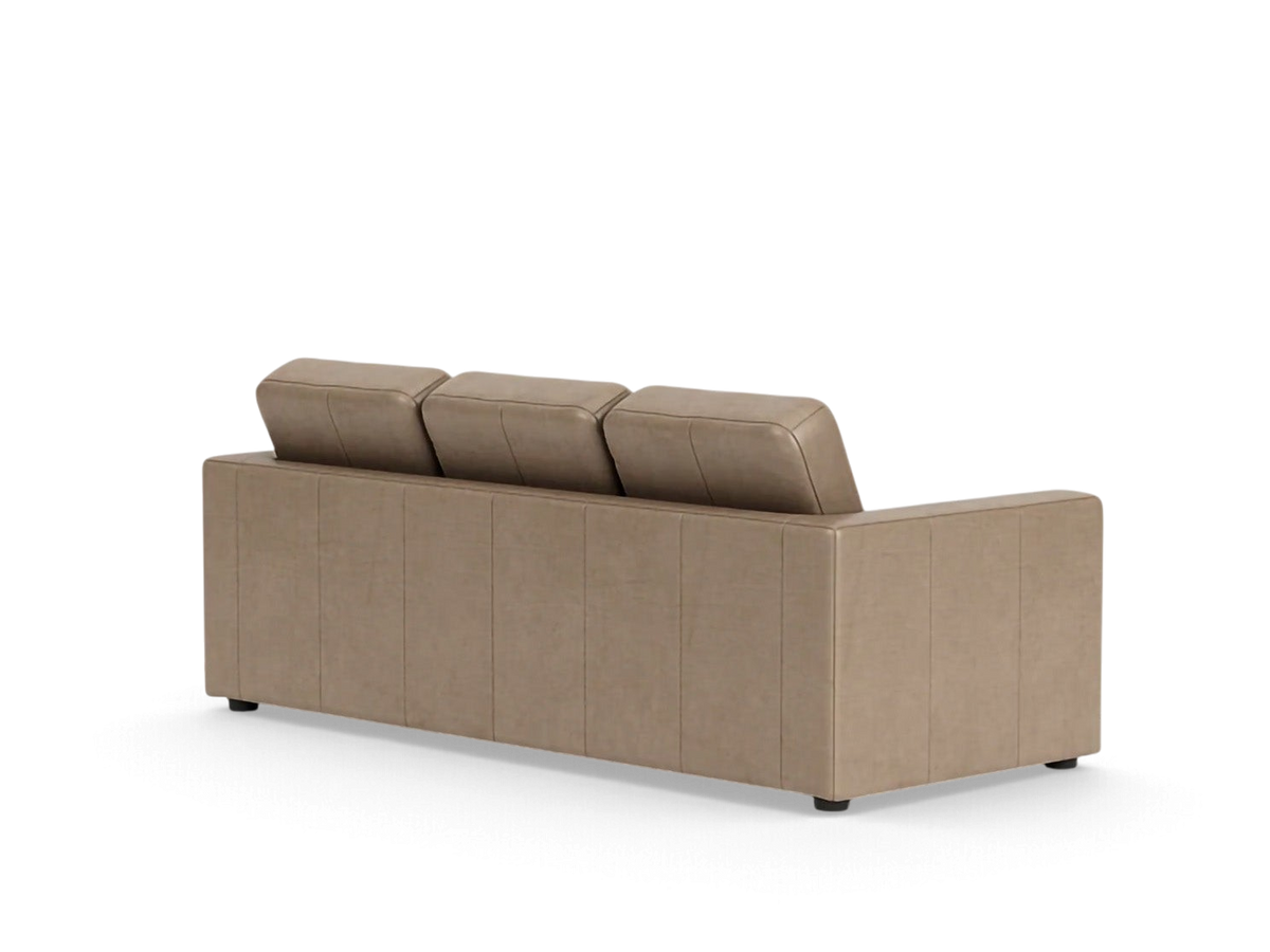Back view of the urbane EQ3 Solo sleeper sofa in a neutral tan fabric with clean architectural lines.