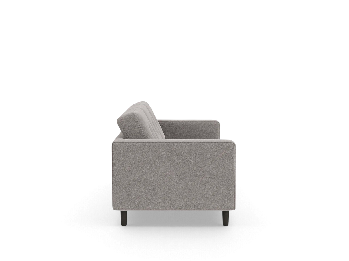 Side view of the urbane EQ3 Solo sofa in a neutral grey textured fabric with simple architectural lines