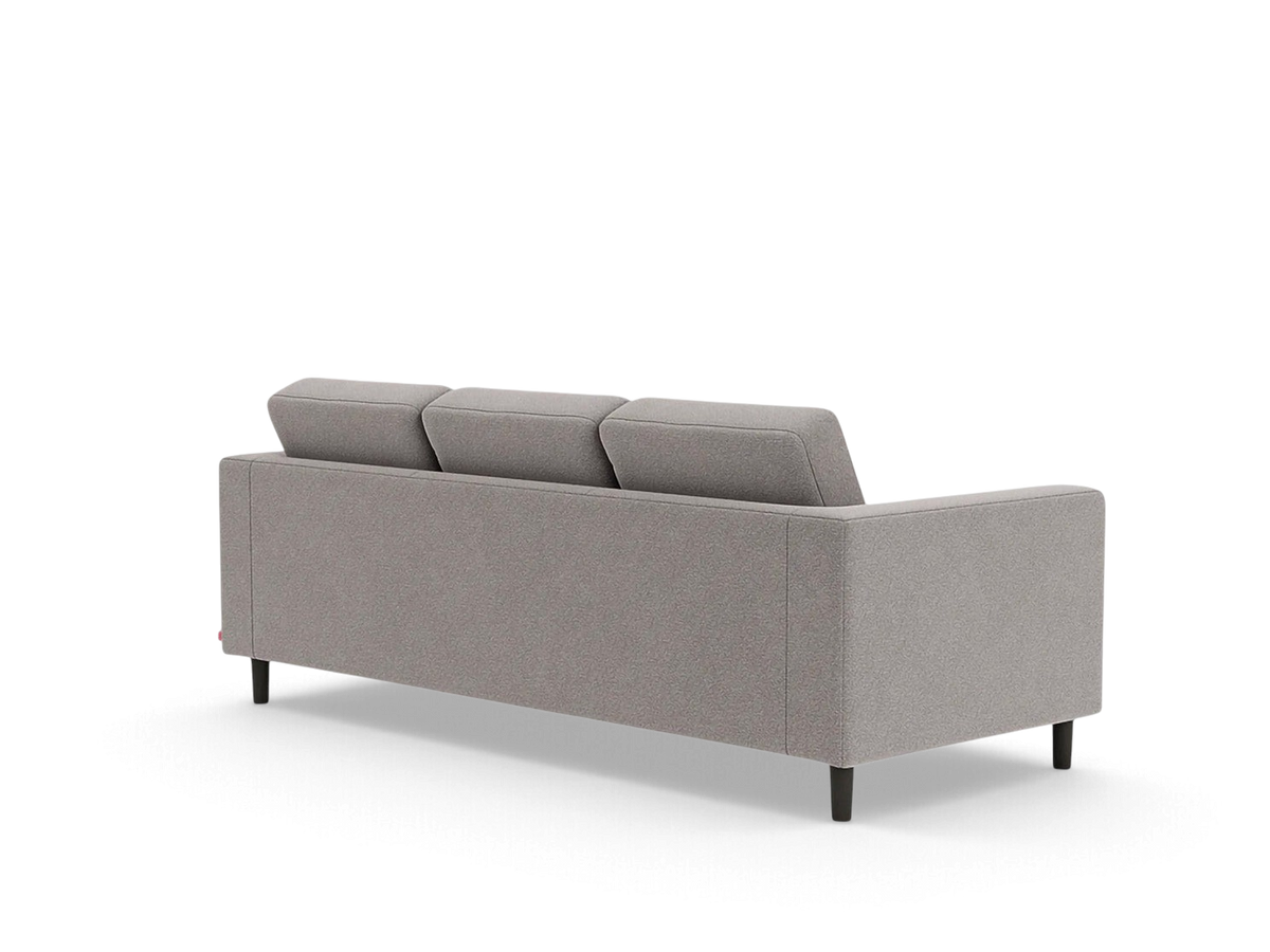 urbane EQ3 Solo sofa in grey fabric with a vintage-inspired architectural design and dark wooden legs, back view
