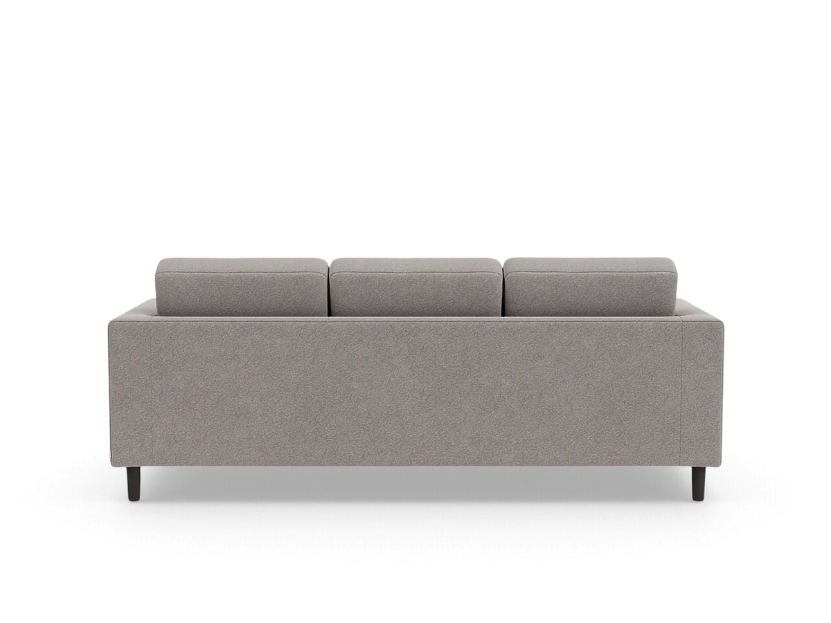urbane EQ3 Solo sofa in a neutral grey fabric with a vintage-inspired design and dark wooden legs, back view